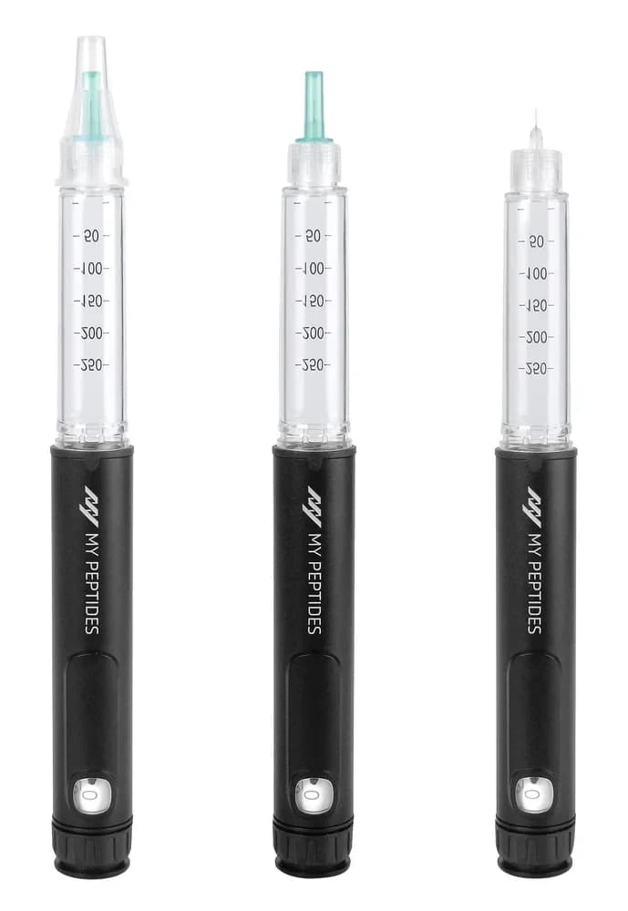 Three auto-injectors side by side, showing the cartridge loaded and the needle fitted